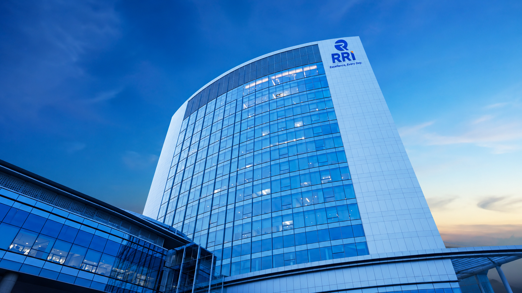 Modern RRI Group corporate office building featuring the RRI logo, representing excellence in real estate, finance, IT solutions, education, healthcare, and investment services in Hyderabad, India.