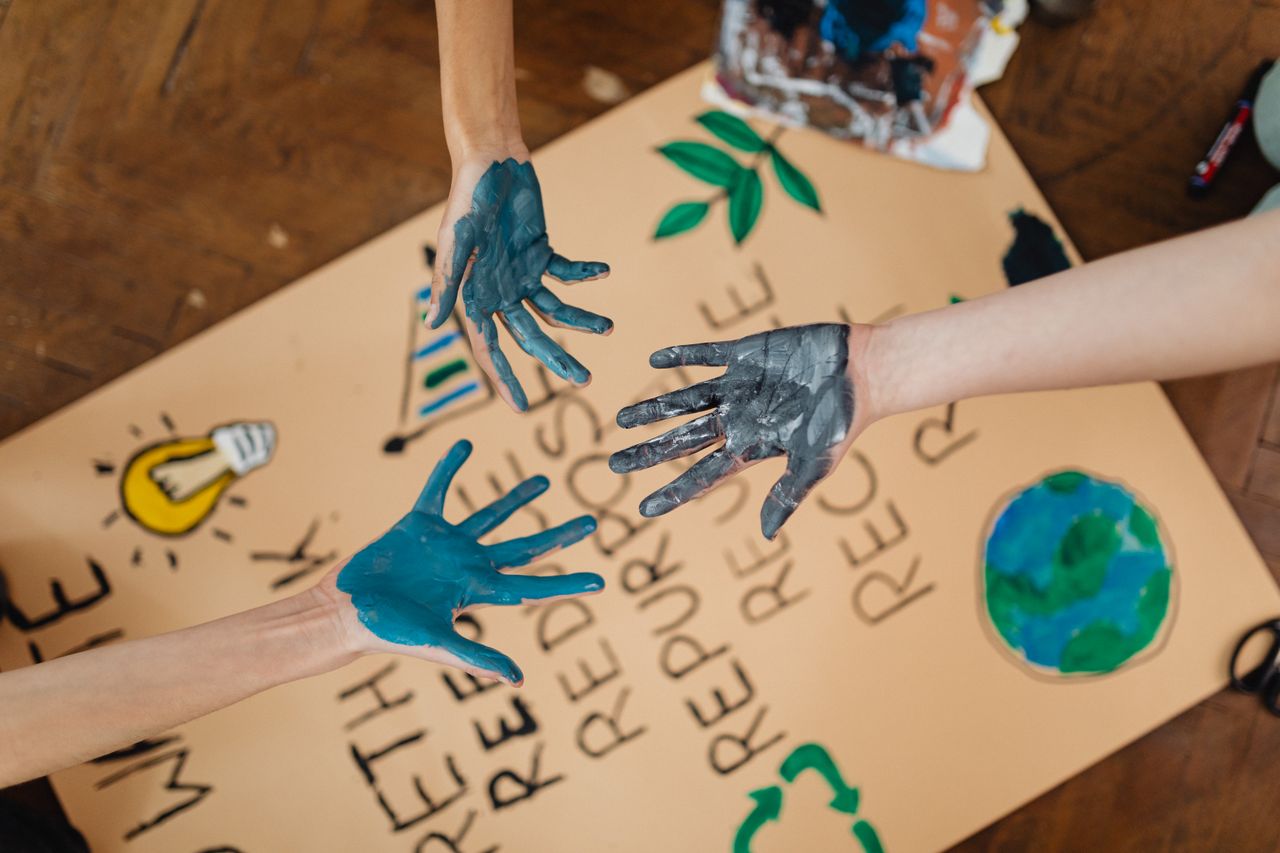 Careers Colorful hands reaching towards creative school project poster.